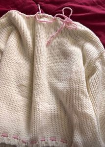 Cozy Cream Knit Sweater with Pink Accents