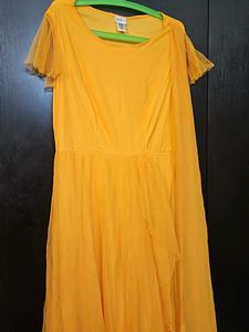 Beautiful Yellow Partywear Gown With Net Pallu