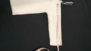 Off-white Short Top For Casual Wear.