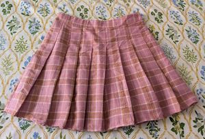 pink pleated checked skirt