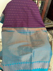 Beautiful Purple Saree with Teal Blouse