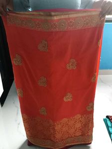 Elegant Orange Embroidered Saree , stiched blouse