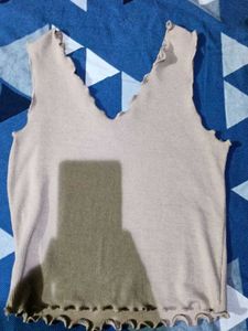 Ribbed V-Neck Top with Ruffle Detail