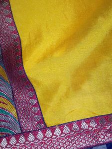 Vibrant Yellow Saree with Ornate Border