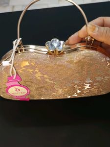 Elegant Golden Party Clutch with Crystal Lock