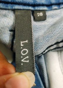 Beige Trousers And Blue Denims