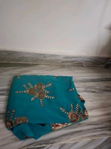 Beautiful Teal Saree with Golden Embroidery