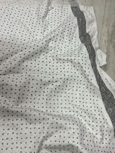 Elegant White material with Paisley Print