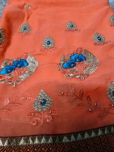 Elegant Orange Embroidered Saree