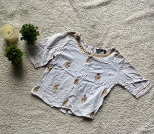 Elegant White Embroidered Short Kurti Like Top