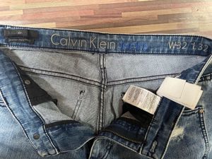 Calvin Klein Distressed Blue Jeans