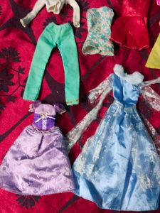 new and old Barbie dolls cloth lot
