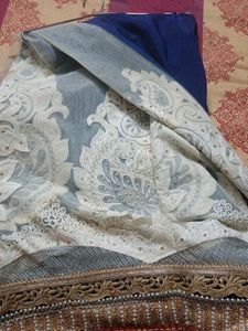 Elegant Blue Saree with White Lace