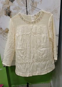 Elegant Beaded Cream top