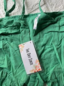 Ruffle knot top.