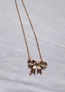 Gold Tone Bow Necklace