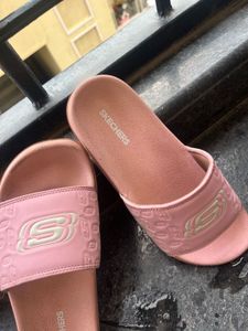 Pink Skechers Slides