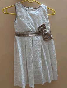 Chic White Lace Dress with Bow Detail