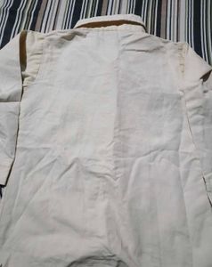 Cream Button-Up Shirt with Ruffle Hem