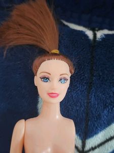 Doll with missing arm