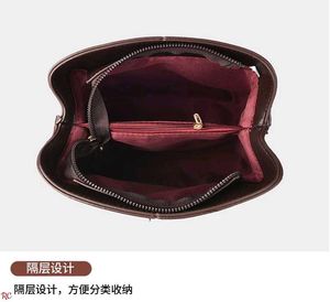 Embossed Elephant Bucket SlinG/Bag