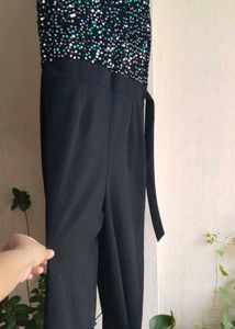 Black sequence jumpsuit with pockets.✨Like new
