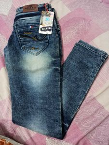 Distressed Blue Denim Jeans