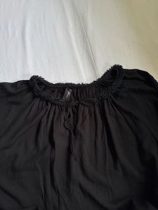 Oversized black tie front blouse