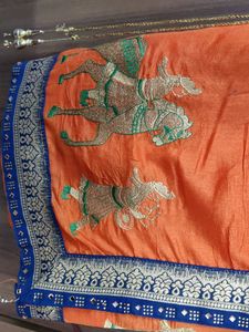 Orange Embroidered Saree with Blue Blouse