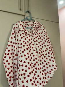 Adorable white button-up shirt with hearts