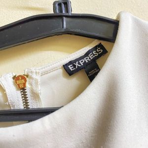 Chic Cream Sleeveless Cropped Top