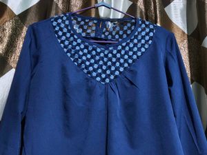 Stylish Blue Top with Embellished Neckline