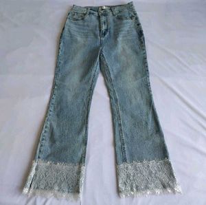 Light Wash Flare Jeans with Lace Trim