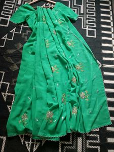Elegant Green Embroidered Saree with readymade blo