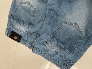 Distressed Blue Denim Jeans