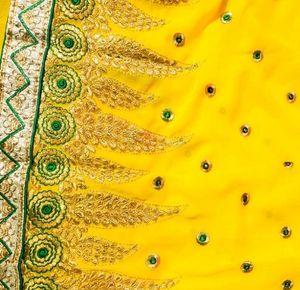 Vibrant Yellow Embroidered Saree with matching blo
