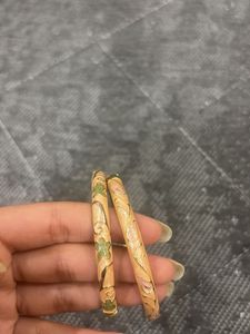 Elegant Gold and Peach Bangles