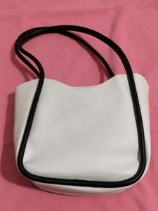 Chic White Tote Bag with Black Trim