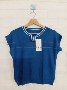 Stylish Blue Top with White Accents