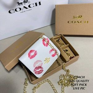 Coach Wallet sling n charm in box packing