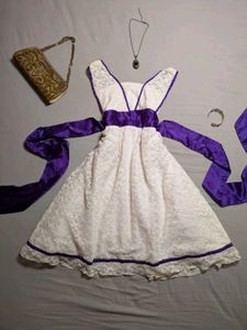 Elegant White Lace Dress with Purple Ribbon