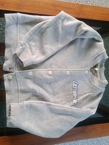 Grey Varsity Jacket.Waist 30 inch, Length 15 inch.