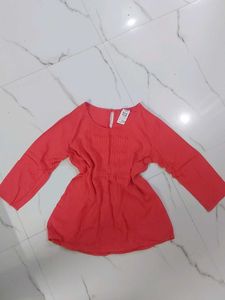 Coral Pleated Empire Waist Top