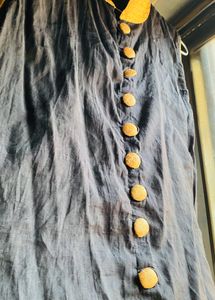 Sleeveless Black Chudidaar With Holden Buttons