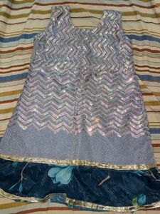 Sparkling frock with comfortable trouser .