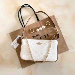 COACH NOLITA DAISY APPLIQUE BAG, FEATURE WITH A PE