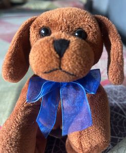Cute Brown Plush Dog Toy with Blue Bow