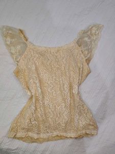 Sheer Lace Peplum Top