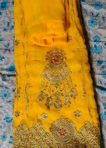 Embroidered Yellow Rajasthani poshak.