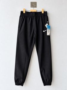Nike Black Swoosh Track Pants